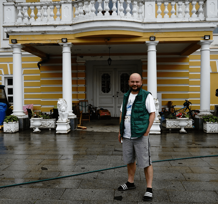 Sergej Mayzus in front of his castle in Chotoviny